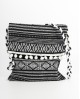 Bolso artesanal bandolera con solapa de borlas - Modelo en blanco y negro con referencia FAL- bolso alpujarra negro y un prec...