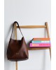 Bolso hobo Noco mediano marrón piel vegana con referencia NOC-2525661M y un precio de 49,15 € de la sección Bolsos de mujer