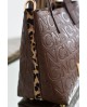 Bolso cubo Noco animal print marrón