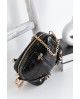 Bandolera mini Noco charol negro hebillas con referencia NOC-2525612N y un precio de 53,70 € de la sección Bolsos de mujer