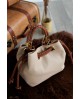Bolso bombonera Noco asas trenzadas beige con referencia NOC-2525608S y un precio de 55,35 € de la sección Bolsos de mujer