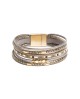 Pulsera multilíneas con piezas metálicas doradas y cierre imán con referencia TAN-06284940 y un precio de 11,25 € de la secci...